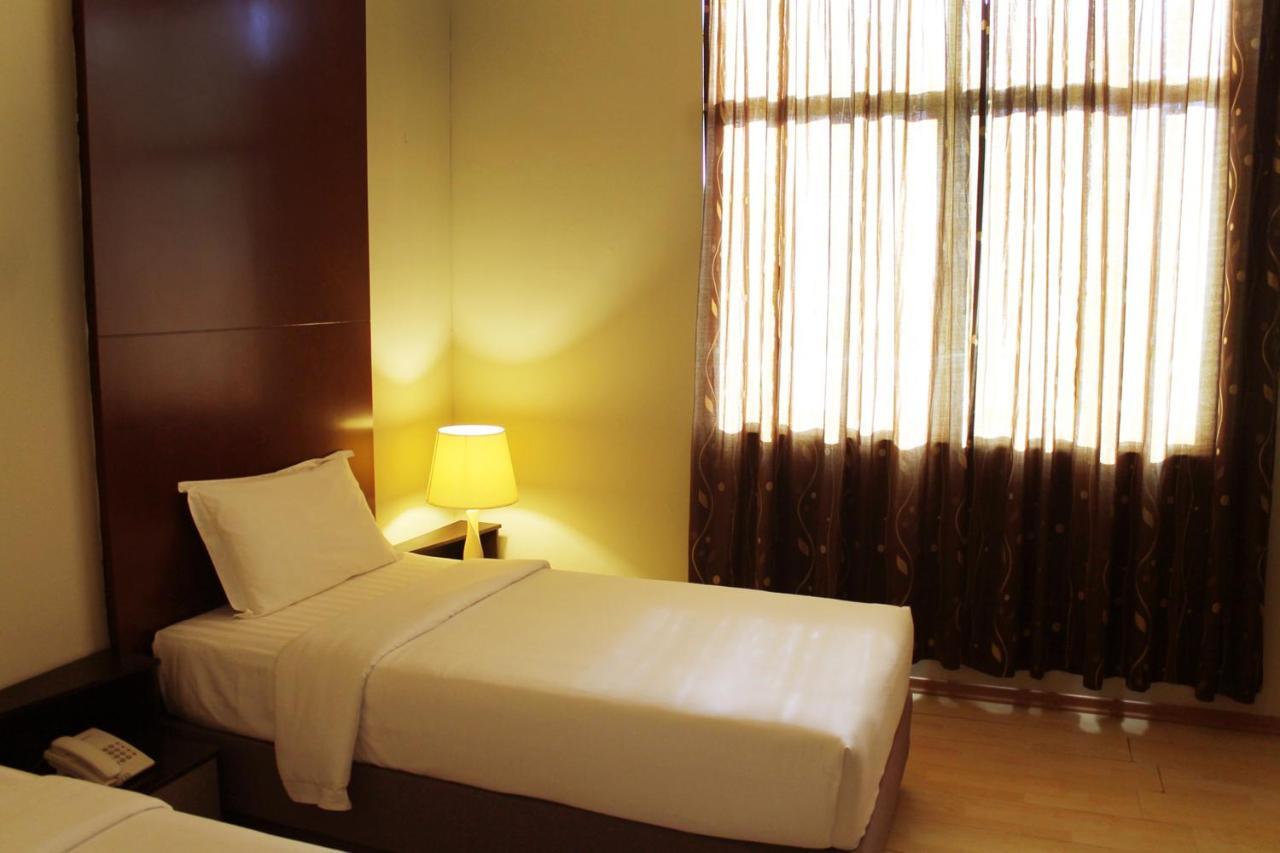 Ginasuite Kompleks27 Hotel 반다르스리브가완 객실 사진